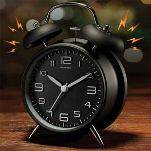 Réveil vintage rond noir en métal pour un réveil efficace