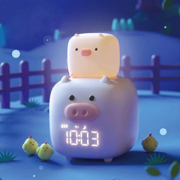 reveil-led-en-forme-de-cochon-a-commande-vocale Réveil cochon musical