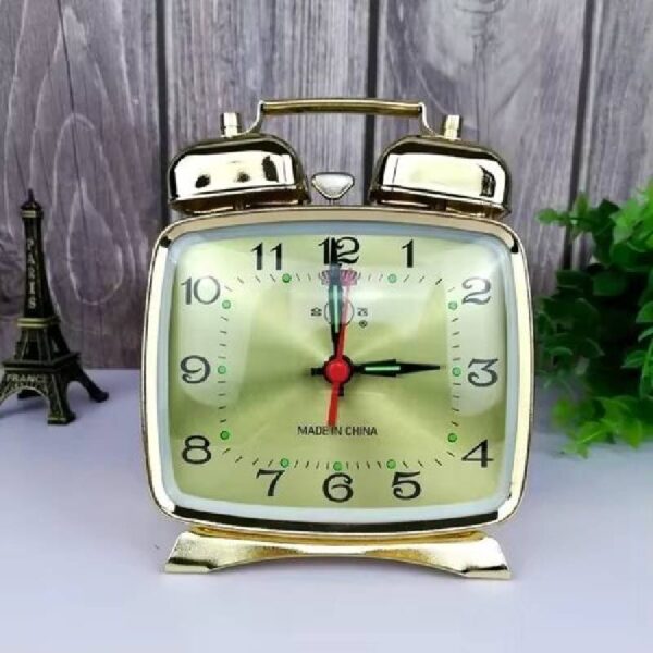 NouveaDu projet Réveil mécanique avec tic-tac or vintage