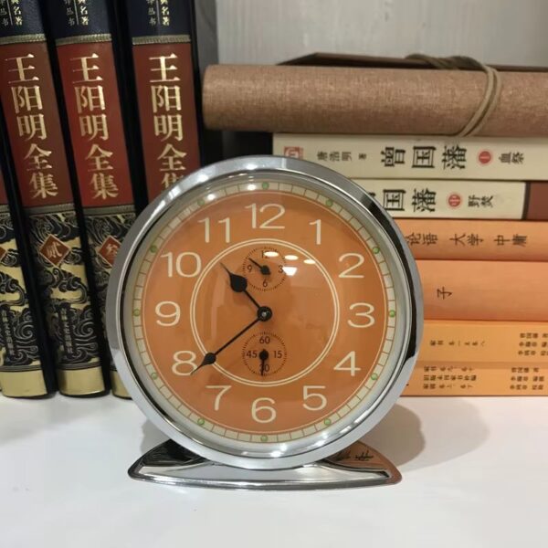 S7a3943acaf744cb384a966b872da71cdi réveil mécanique vintage chrome seventies