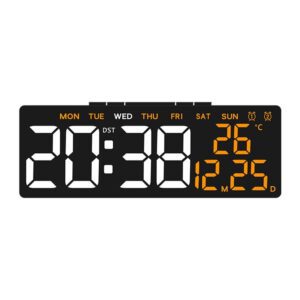 Réveil numérique noir affichant 20:38, la date du 25 décembre et 26°C, avec affichage des jours de la semaine.